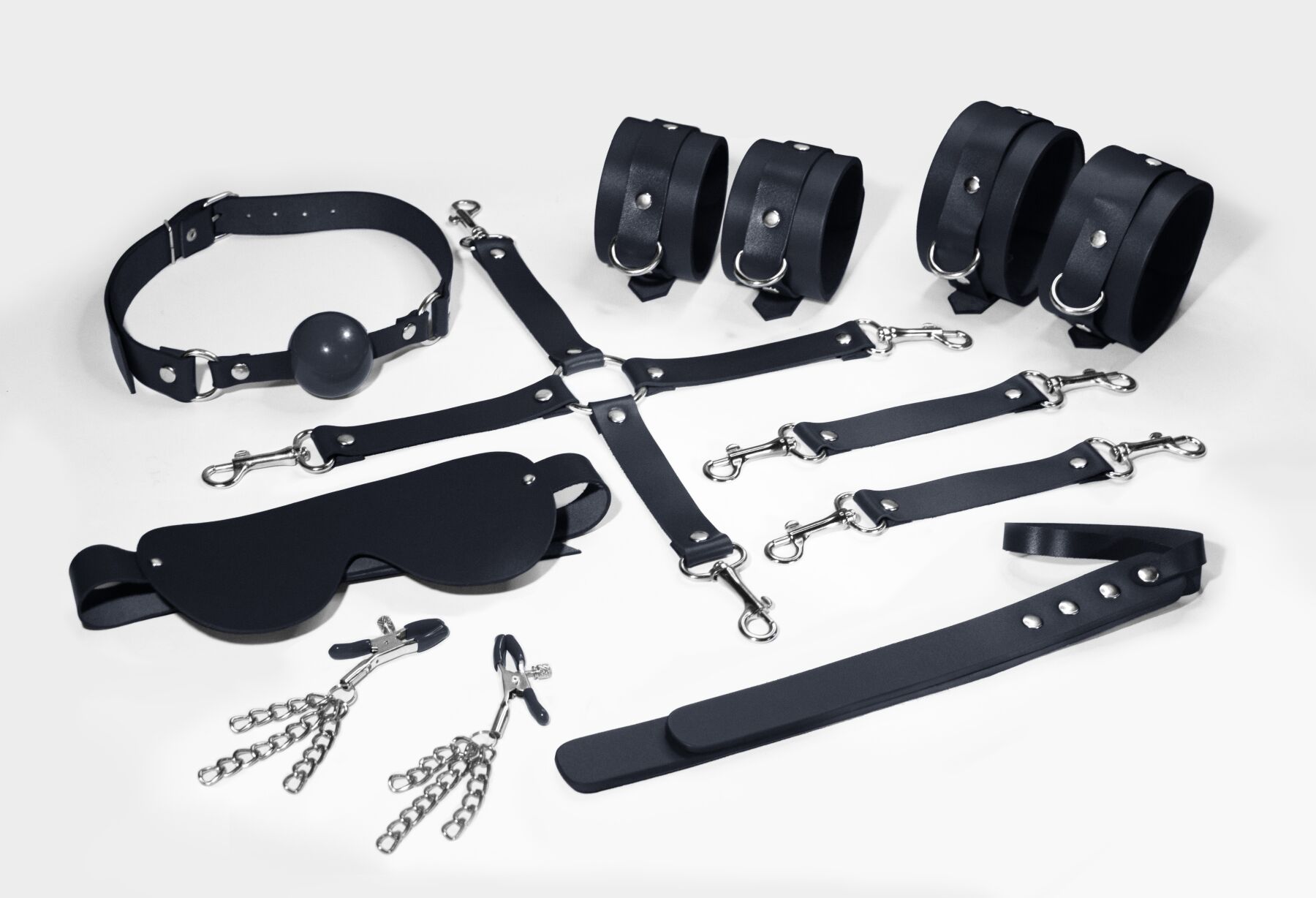 Набір Feral Feelings BDSM Kit 7 Black, наручники, пон�ожі, конектор, маска, падл, кляп, затискачі