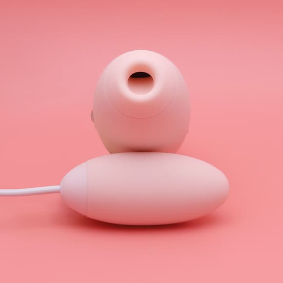 Вакуумный стимулятор с виброяйцом 2-в-1 KISSTOY Miss VV Pink